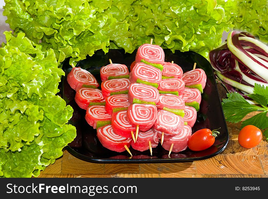 Ready to cook fresh beef skewers with vegetables