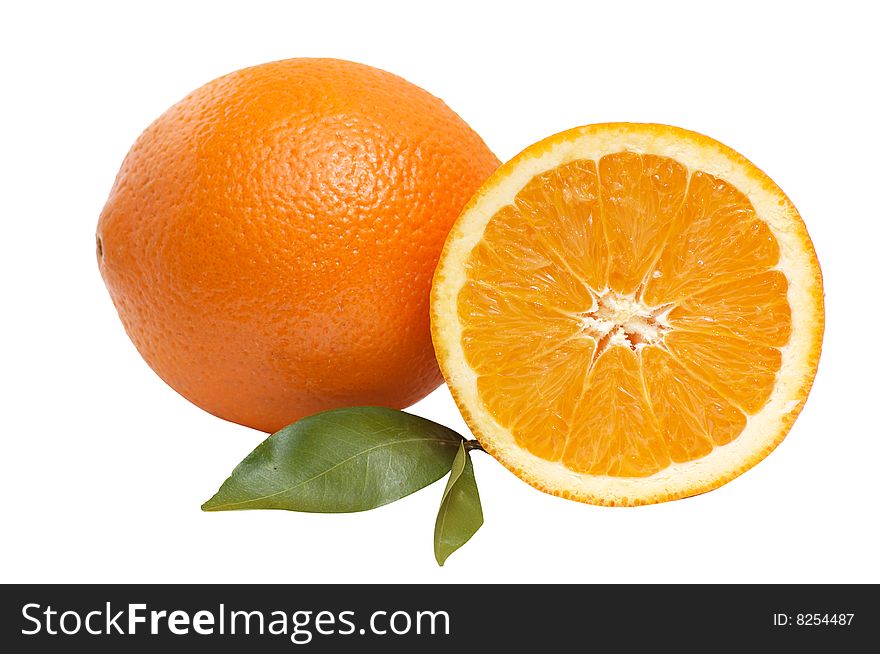 Ripe, juicy  oranges with green leaves isolated on a white background. Ripe, juicy  oranges with green leaves isolated on a white background.