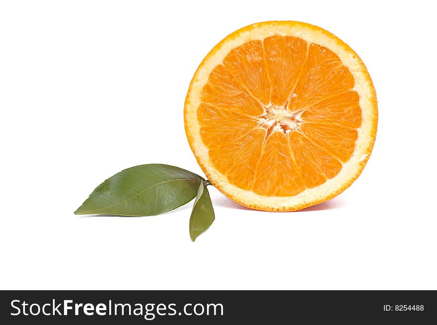 Juicy,ripe orange and green leaves isolated on a white background. Juicy,ripe orange and green leaves isolated on a white background.