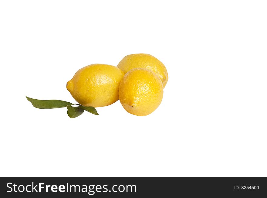 Three lemons with leaves isolated  on a white background. Three lemons with leaves isolated  on a white background.