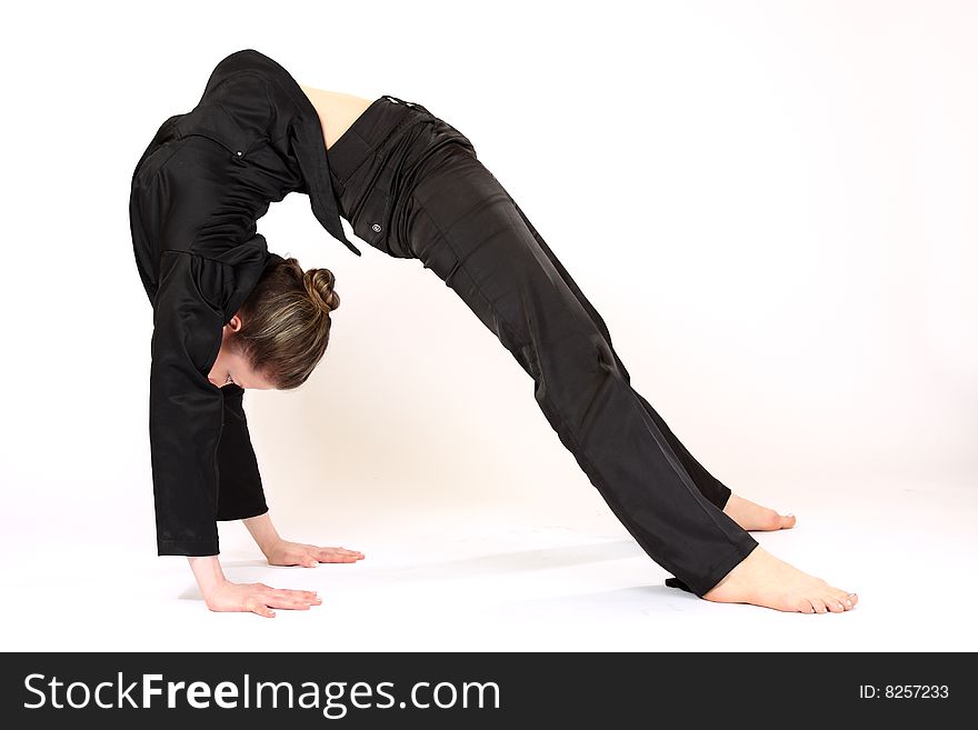 Flexible woman on the floor