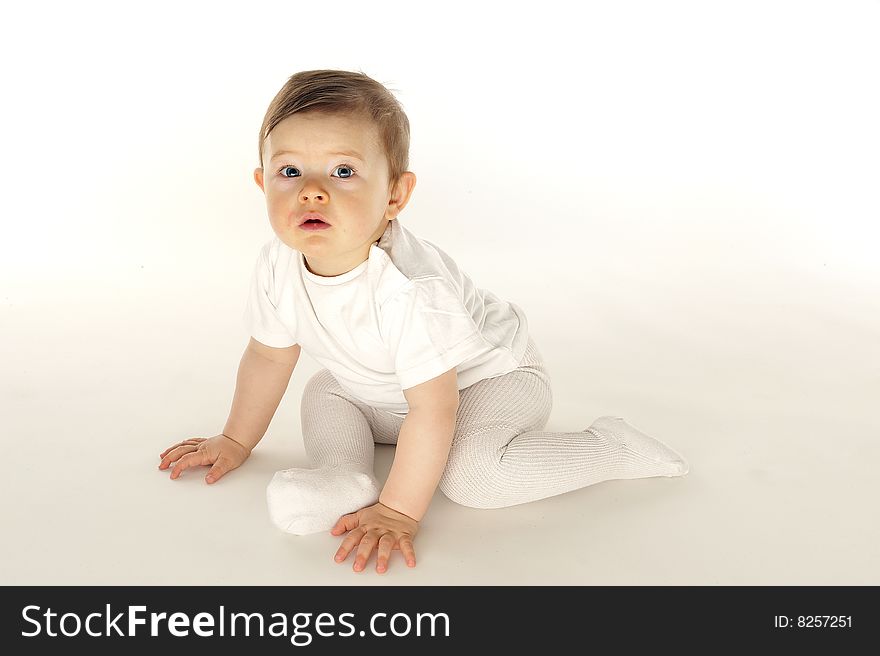 Cute Little Baby In White Field