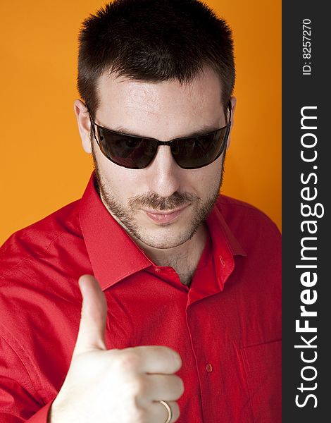 Man With Sunglasses Showing Thumbs Up