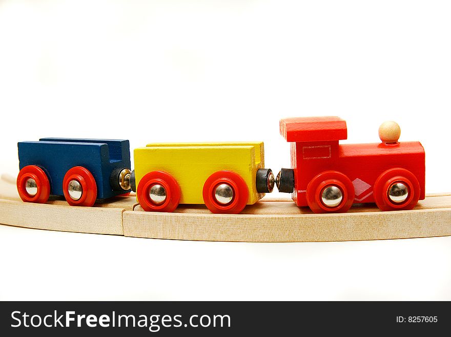 Wooden train over white background