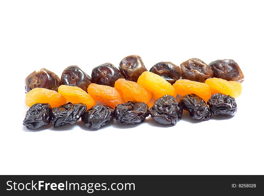 Different  dried fruits isolated on a white  background. Different  dried fruits isolated on a white  background.