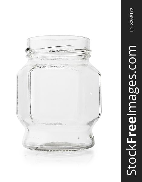 Empty glass jar on white background