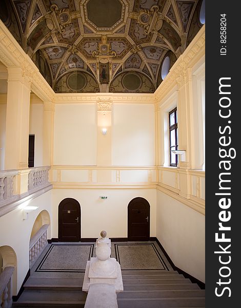 Empty elegant staircase with painted roof