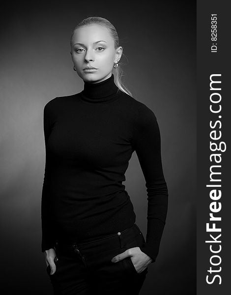 Beautiful blond girl, grayscale, studio shot