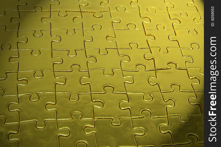 Background of gold jigsaw puzzle