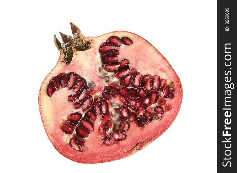 Half of pomegranate on white ground