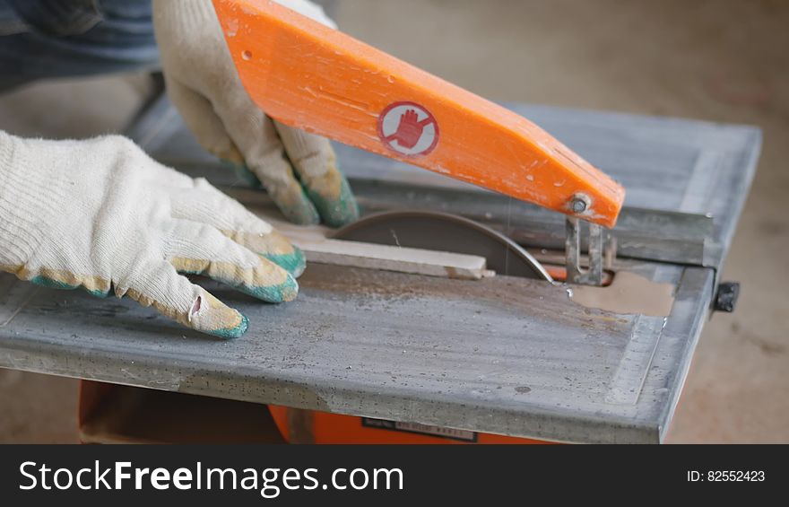 Cutting ceramic tile on the machine. 4K