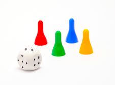 Dice And Four Pieces Royalty Free Stock Image