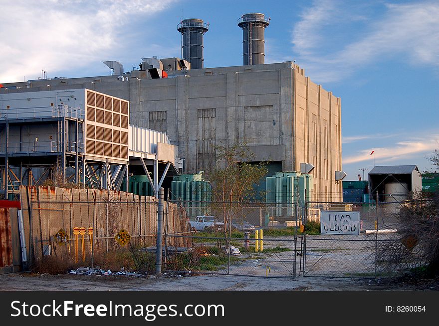 An old coal fired power plant in an industrial section of the Port of Los Angeles. An old coal fired power plant in an industrial section of the Port of Los Angeles.