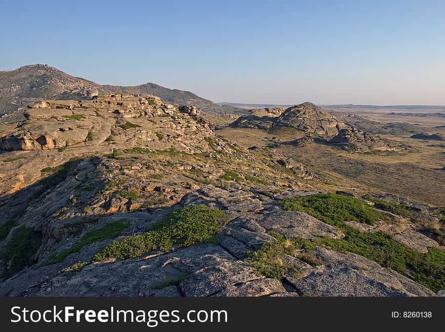 Mountain with rocks under blue sky. Mountain with rocks under blue sky