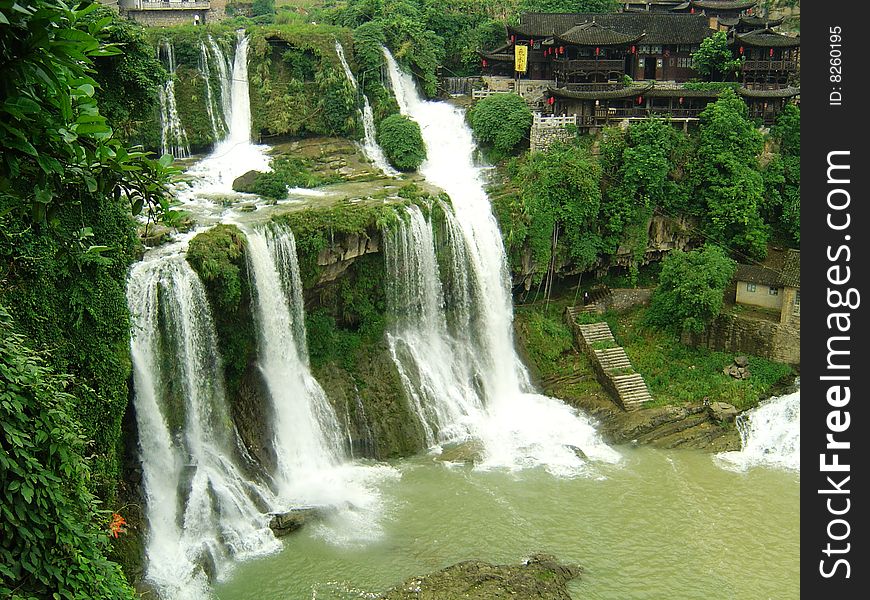 Summer river waterfalls formed together