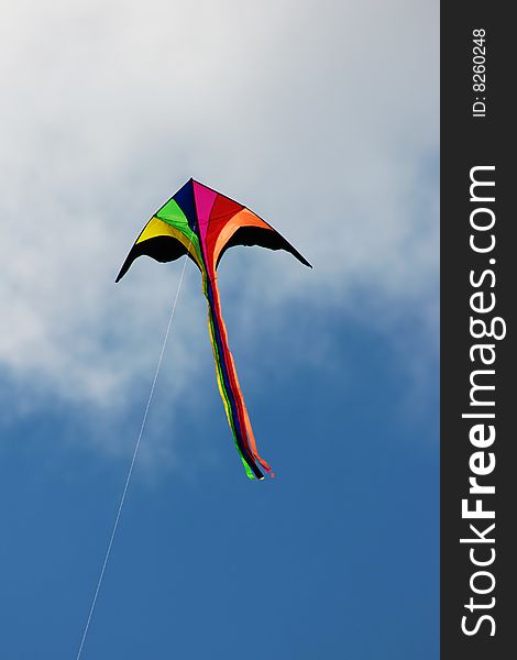Colored kite in blue sky. Colored kite in blue sky