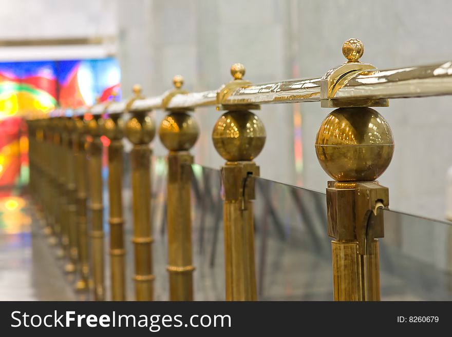 Gold railing in museum hall. Gold railing in museum hall