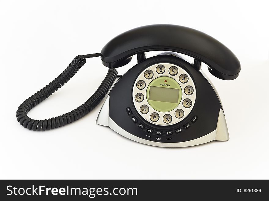 Black telephone isolated on white