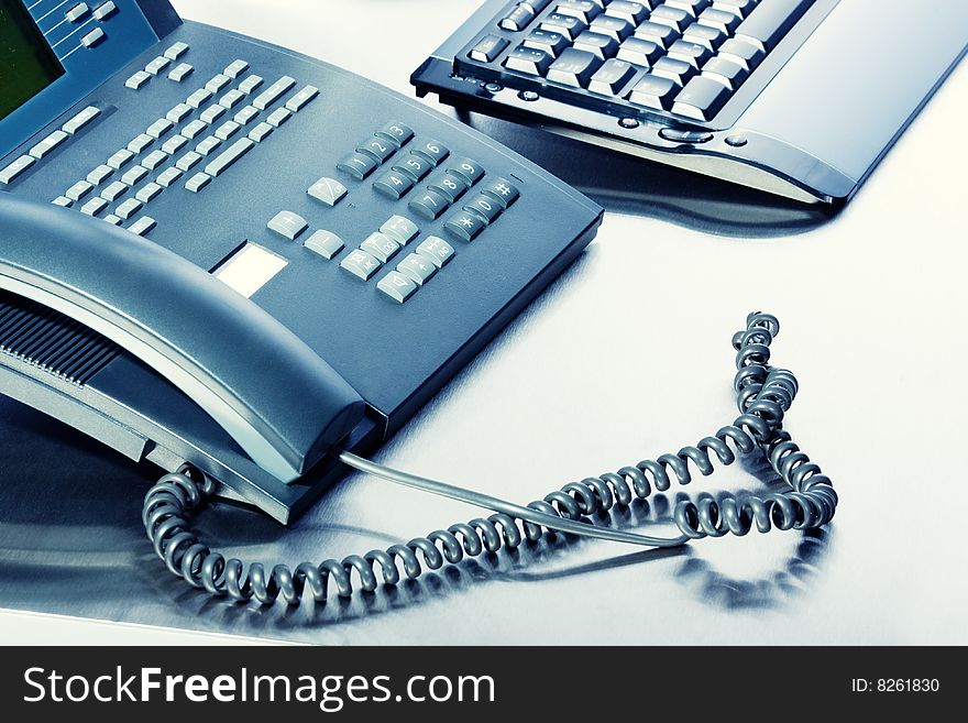 Business concept - keyboard, telephone - high key