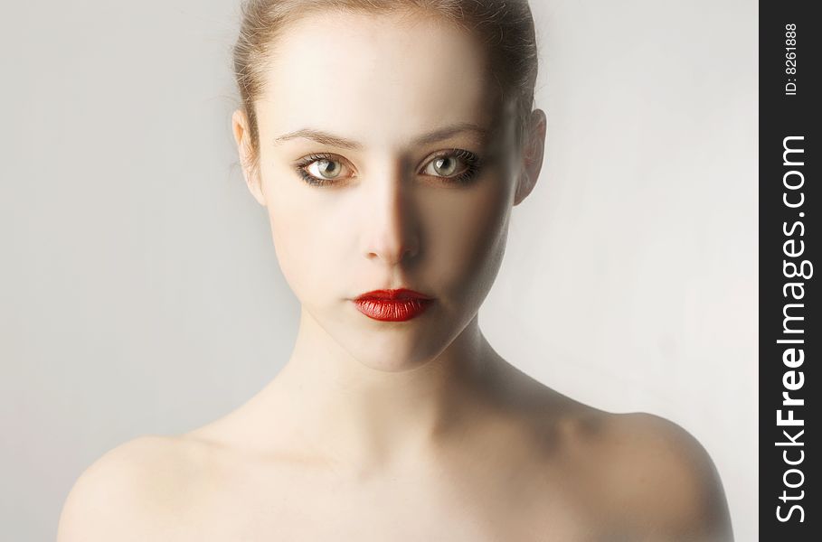 Portrait of a beautiful girl with red lips. Portrait of a beautiful girl with red lips