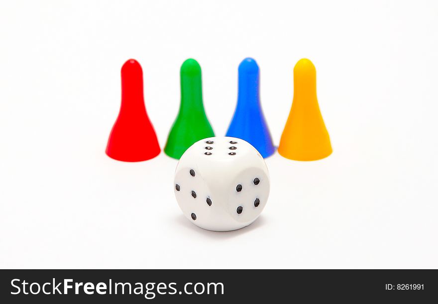 Dice and four pieces isolated on white background