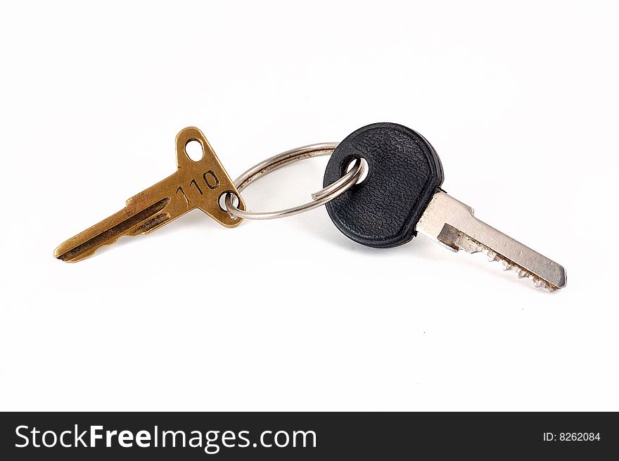 Two keys lie on a white background