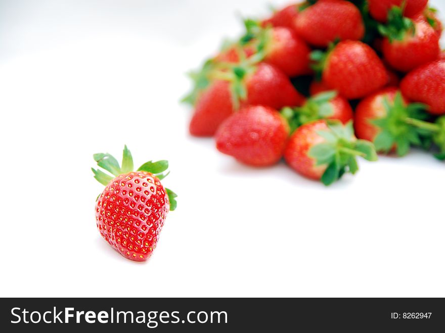 Red strawberries on white background. Red strawberries on white background.