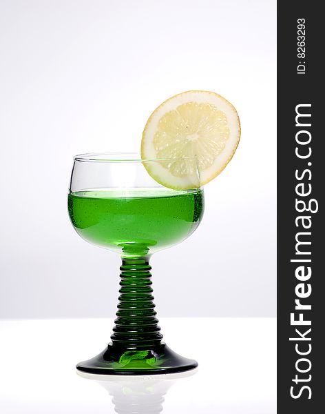 Cocktail with lime isolated on the white. Cocktail with lime isolated on the white