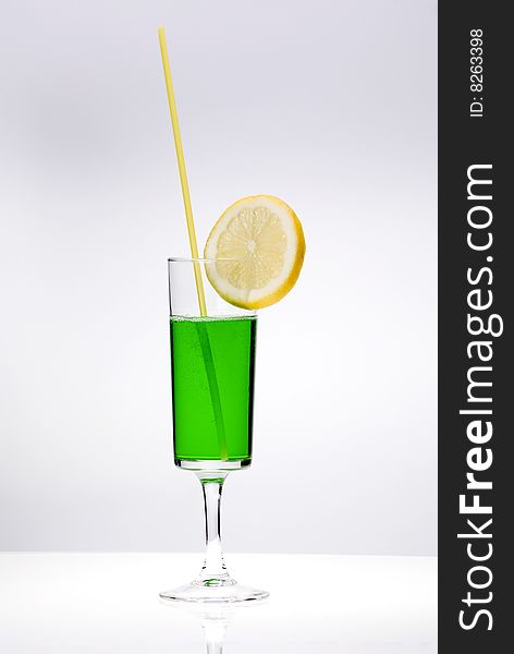 Cocktail with lime isolated on the white. Cocktail with lime isolated on the white