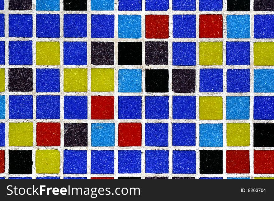 Colourful glass tiles on a wall. Colourful glass tiles on a wall