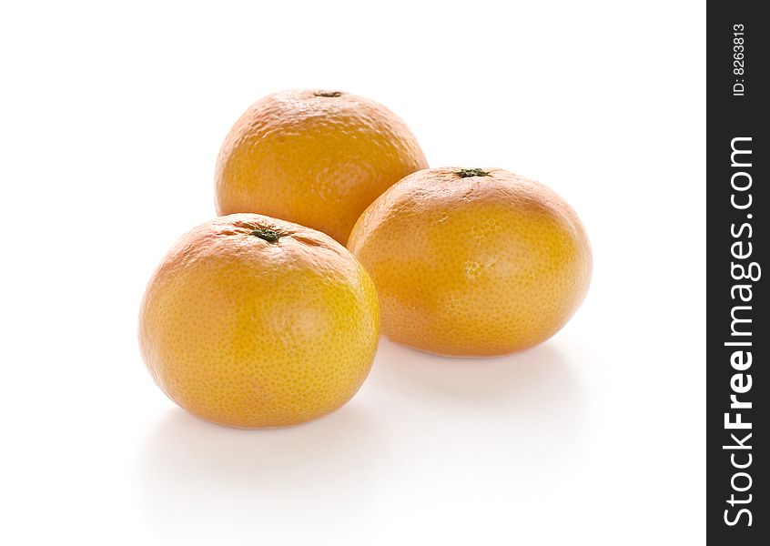 Bright mandarins in white background