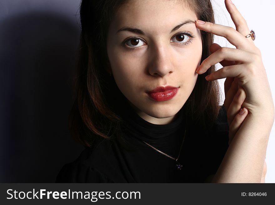 Portrait of the girl with a ring on a hand close up. Portrait of the girl with a ring on a hand close up.