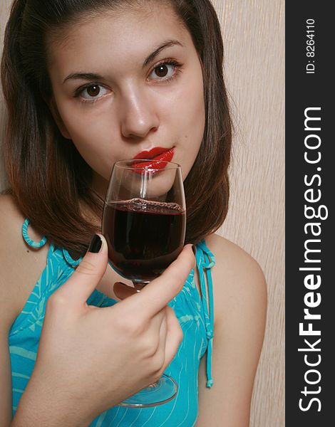 Portrait of the girl with a glass of wine. Portrait of the girl with a glass of wine.