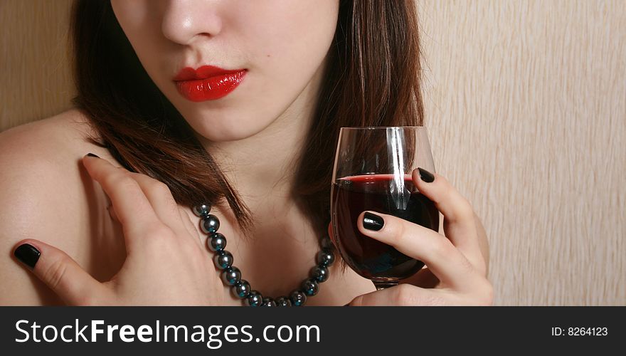 Portrait of the girl with a glass of wine. Portrait of the girl with a glass of wine.