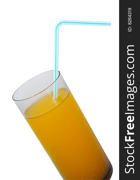 A glass with yellow drink