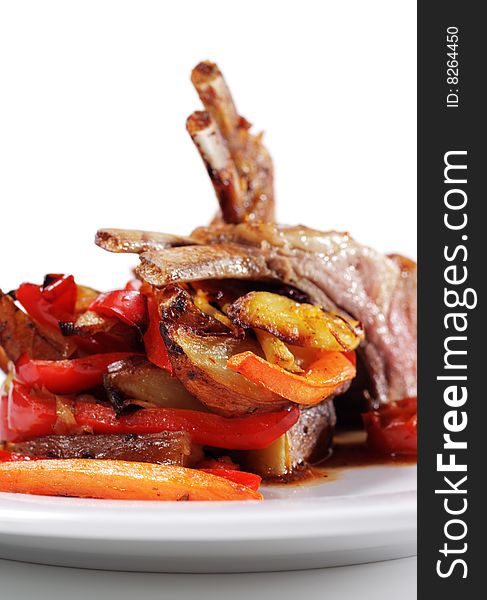 Roasted Lamb Chops with Asian-Style Vegetables. Isolated on White Background