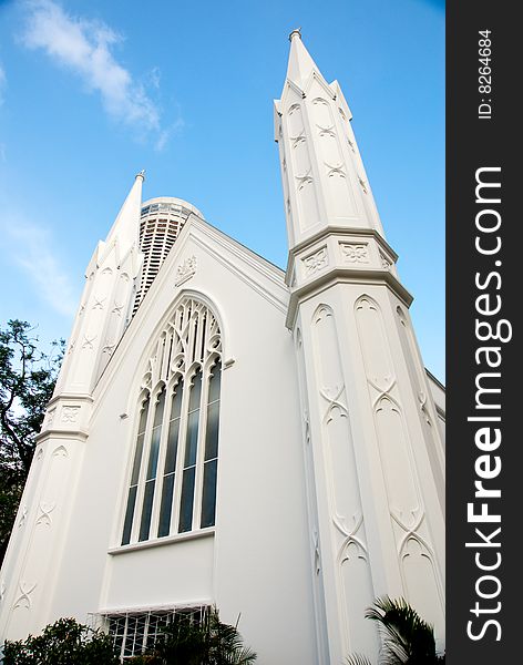 White church exterior against blue sky in singapore