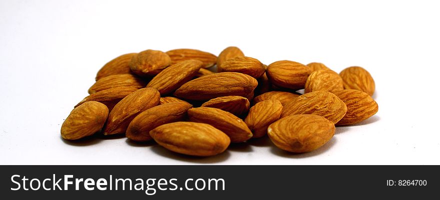 Collection of almonds isolated on white.