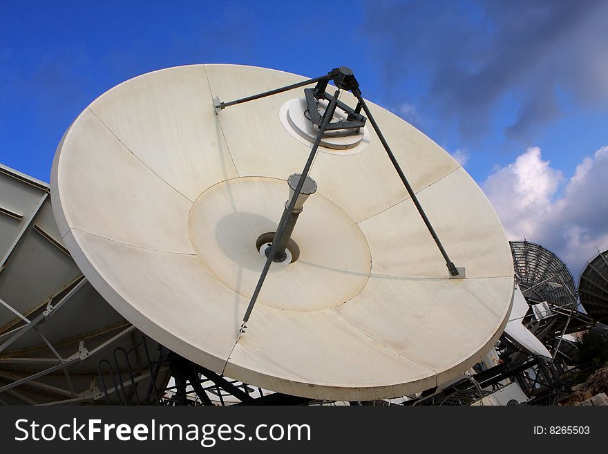 Antenna over the blue sky with some clouds. Antenna over the blue sky with some clouds