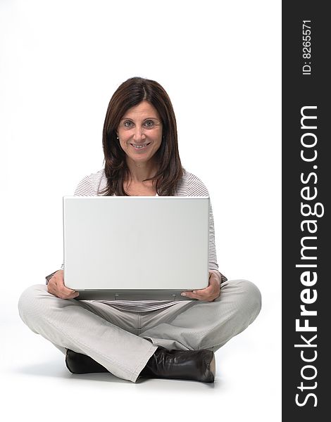 Woman working on a laptop from home. Woman working on a laptop from home