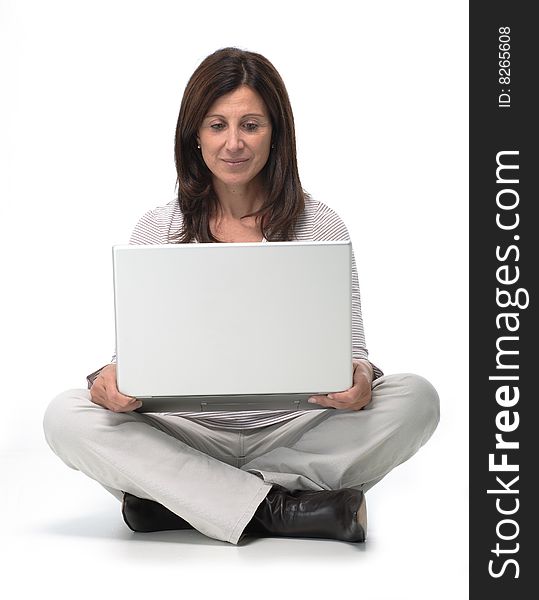 Woman working on a laptop from home. Woman working on a laptop from home