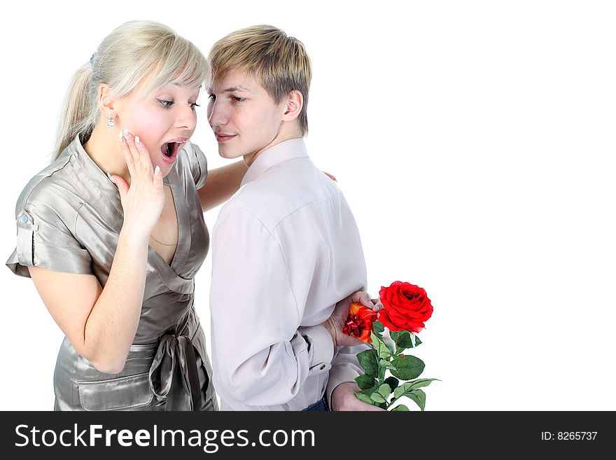 Couple with gift and flower isolated on white