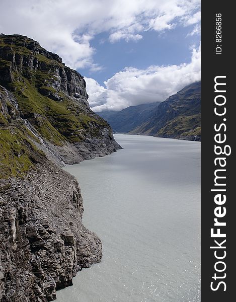 View on swiss high  mountain lake in Switzerland, vertical. View on swiss high  mountain lake in Switzerland, vertical