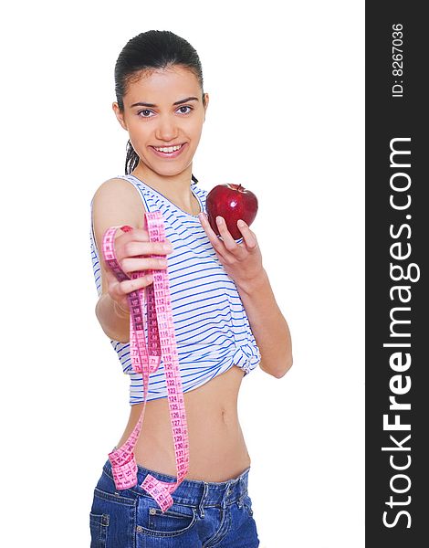 Portrait of cute young woman holding red apple and measuring tape. Portrait of cute young woman holding red apple and measuring tape