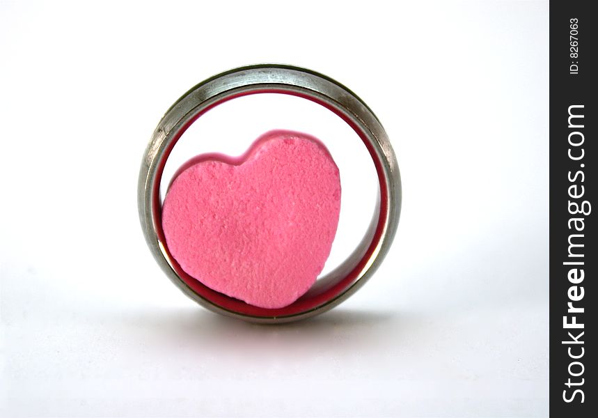 Silver ring with a candy heart in the middle. Silver ring with a candy heart in the middle.