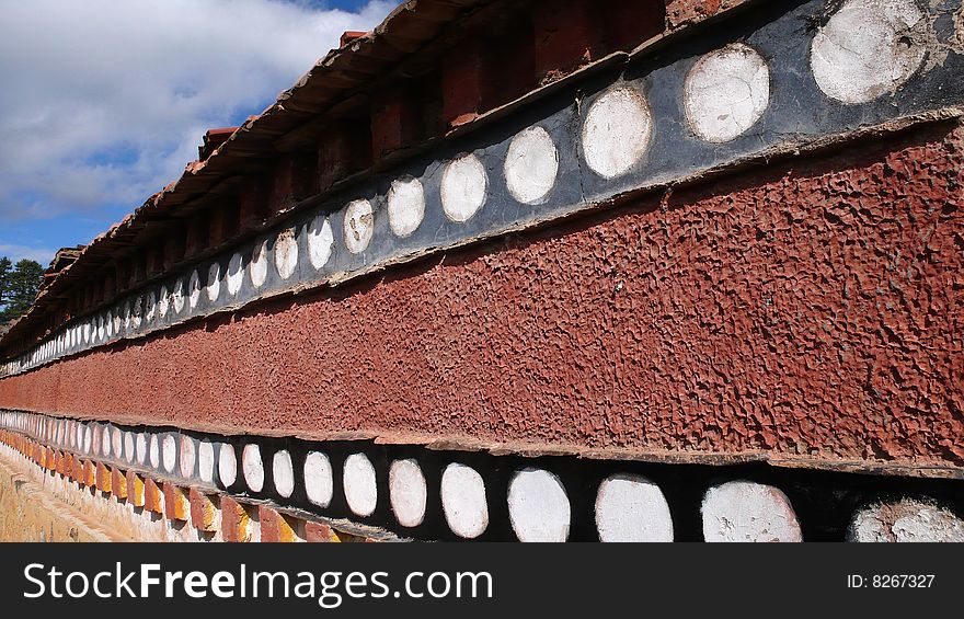 A wall of Tibetan style in a lamasery. A wall of Tibetan style in a lamasery