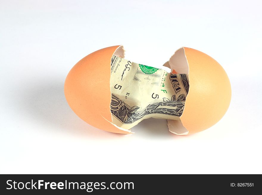 1 dollar in the broken egg. 1 dollar in the broken egg.