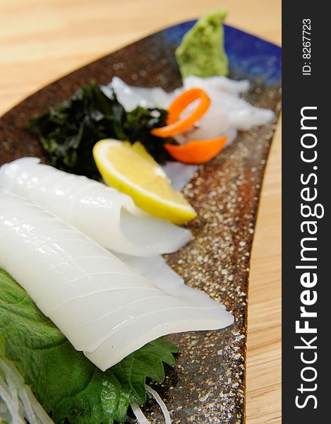 Japanese sashimi on a white dish