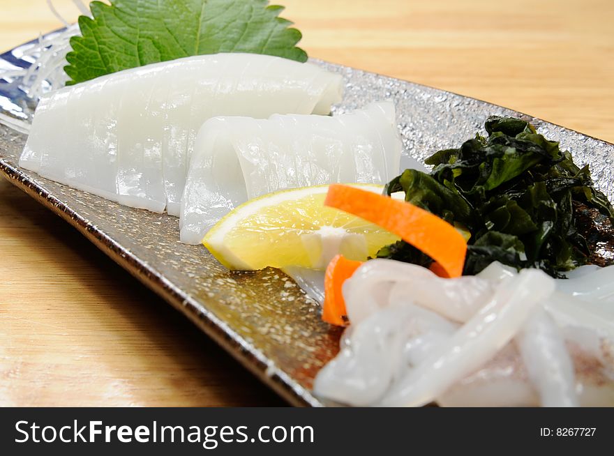 Japanese sashimi on a white dish