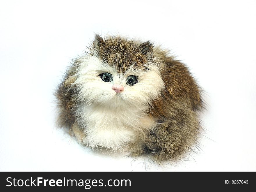 Toy kitten with a fluffy wool. Toy kitten with a fluffy wool
